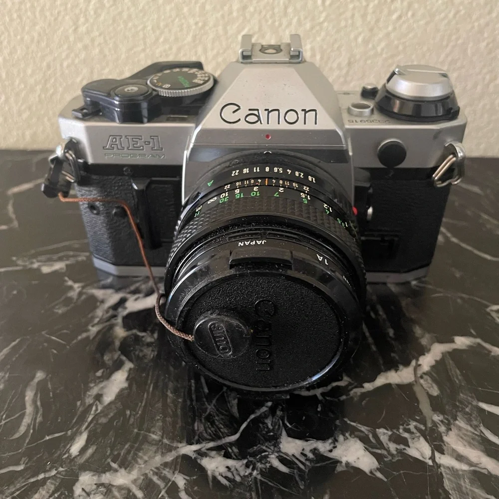 Canon AE-1 Black and Silver Film Camera with Flash 188A